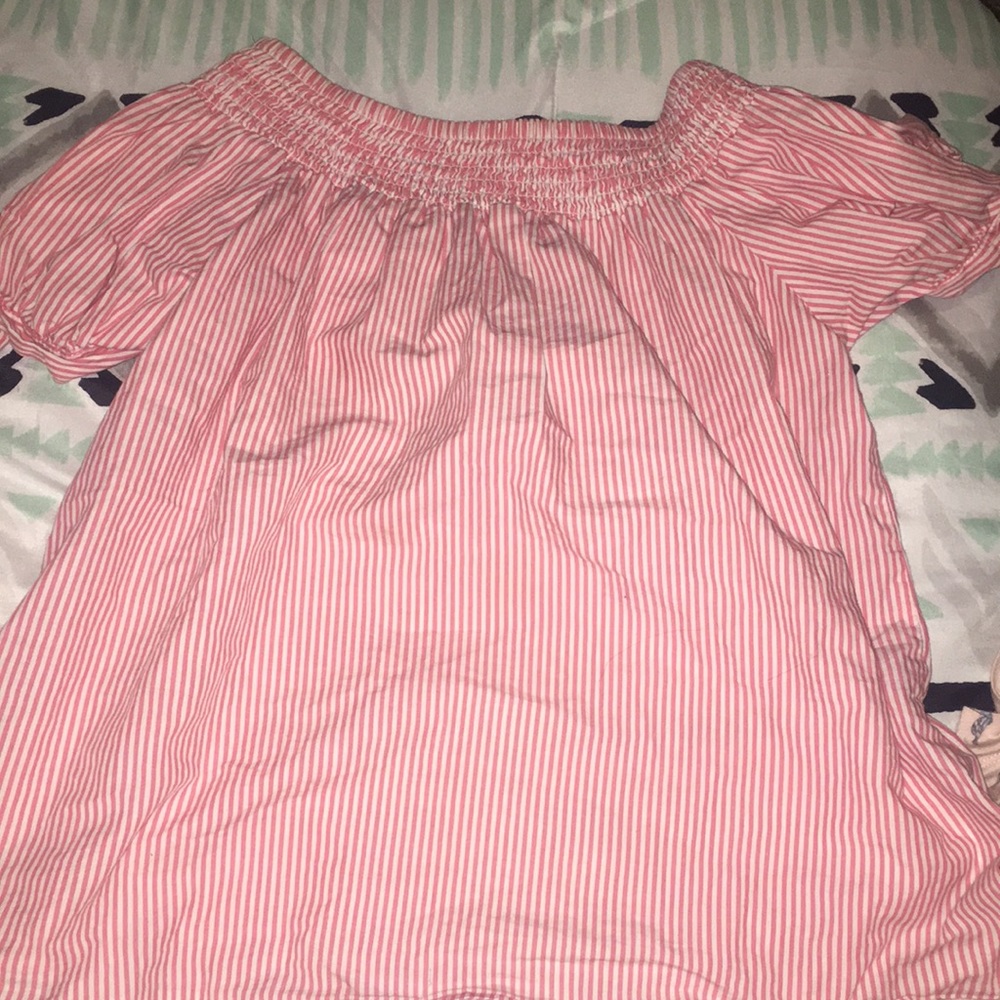 A cute pink off the shoulders top